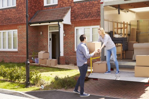 Van loading process with trained staff handling items carefully