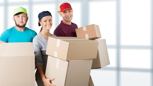 Loading furniture into a removals van in Dagenham