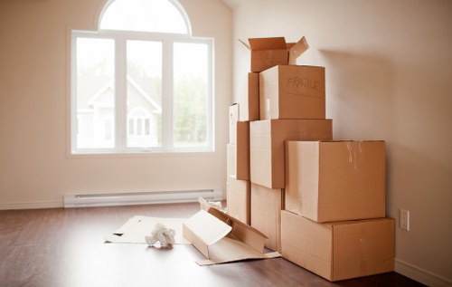 Household boxes and furniture ready for transport in Dagenham