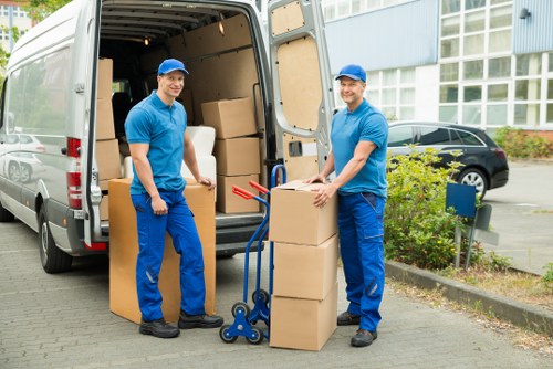 Careful loading of office furniture for a Dagenham relocation