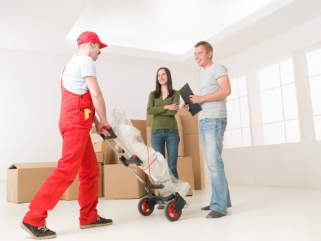 Furniture being carefully moved from a Dagenham property into a van