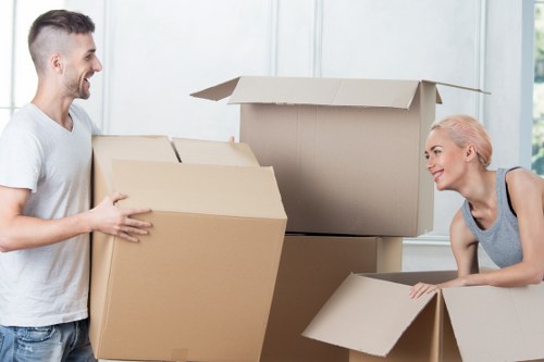 Commercial move planning with labelled boxes and office equipment for a Dagenham business