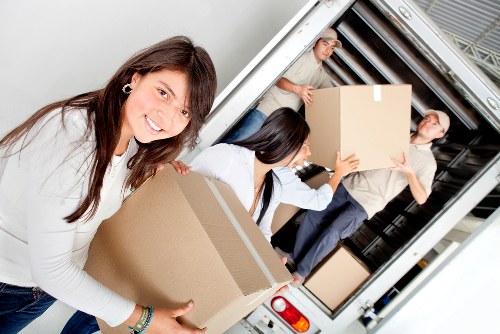 Packed boxes and moving equipment prepared for a local Dagenham move